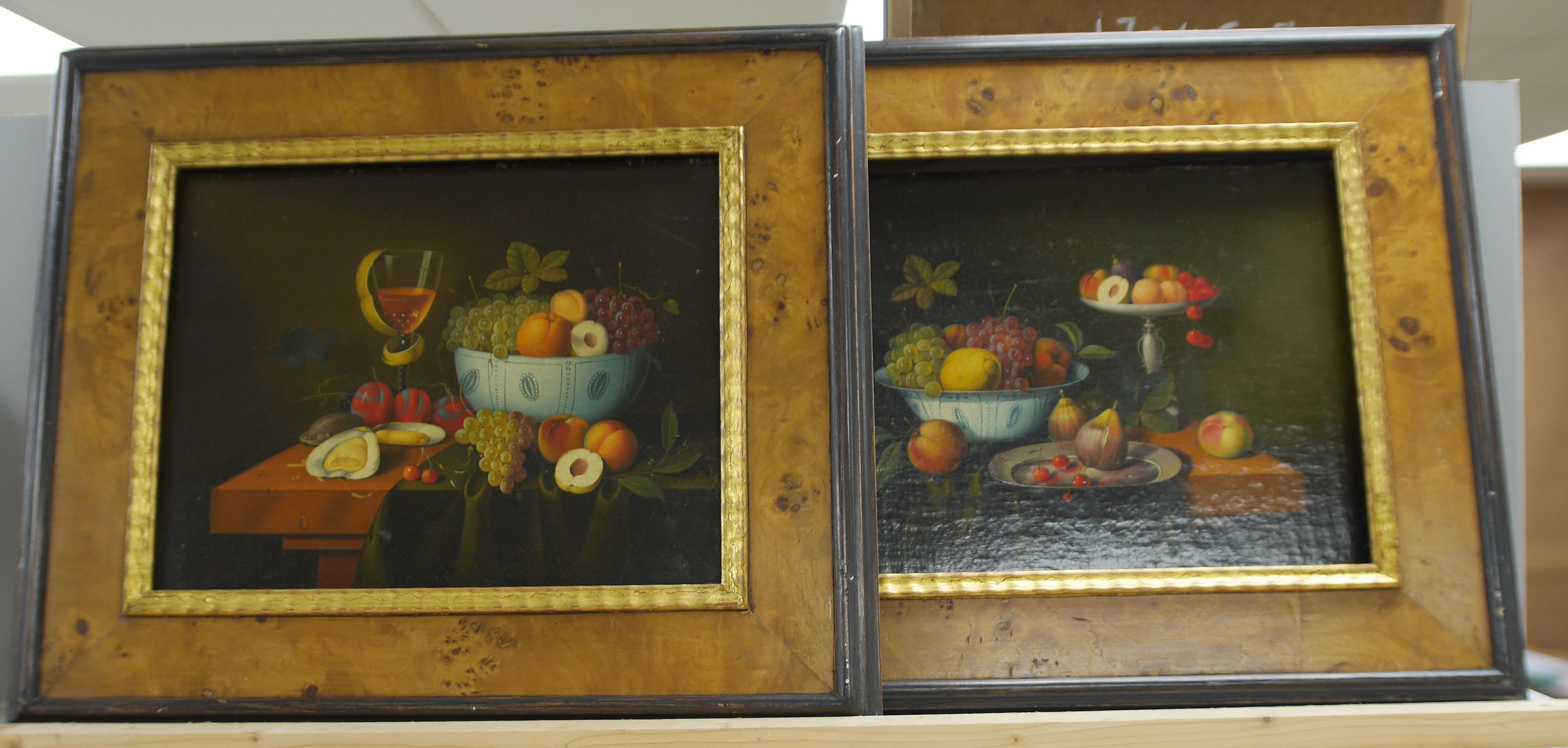 20th century, Dutch School, pair of oils on canvas, Still lifes of fruit, 22 x 29cm, housed in burr maple frames. Condition - fair, loose within frames